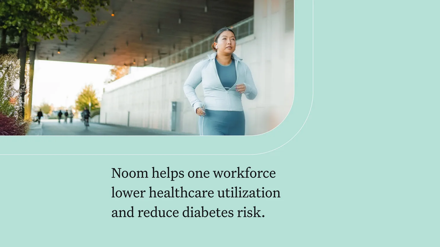 Keeping active outdoors, a woman jogs under a modern overpass, promoting health and wellness with a focus on weight loss and diabetes prevention through Noom.